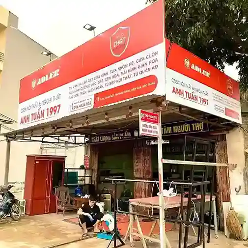 Biển hộp đèn cho cửa hàng nhôm kính tại mặt tiền tuyến phố